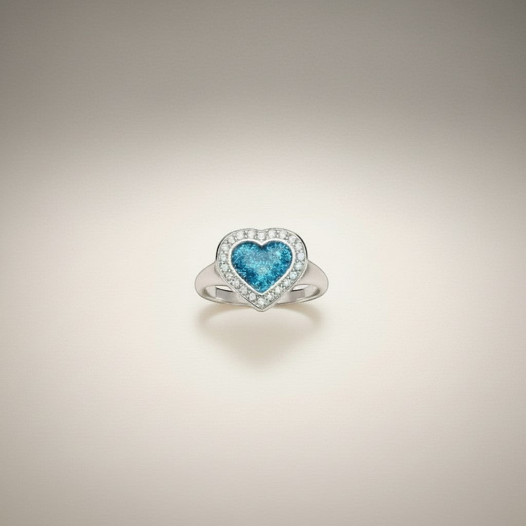 Ashes In Jewellery Heart Halo Memorial Ring with blue stone and diamond halo.