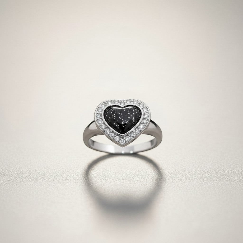 Ashes In Jewellery gold heart halo memorial ring with black speckled stone and clear crystals.