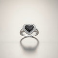 Ashes In Jewellery gold heart halo memorial ring with black speckled stone and clear crystals.