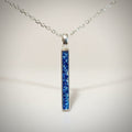 Ashes In Jewellery sterling silver bar pendant necklace with blue glitter resin inlay on a delicate silver chain.