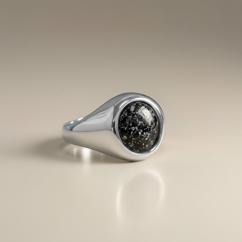 Ashes In Jewellery gents oval traditional signet ring with a black speckled stone face, crafted from silver.