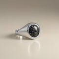 Ashes In Jewellery gents oval traditional signet ring with a black speckled stone face, crafted from silver.