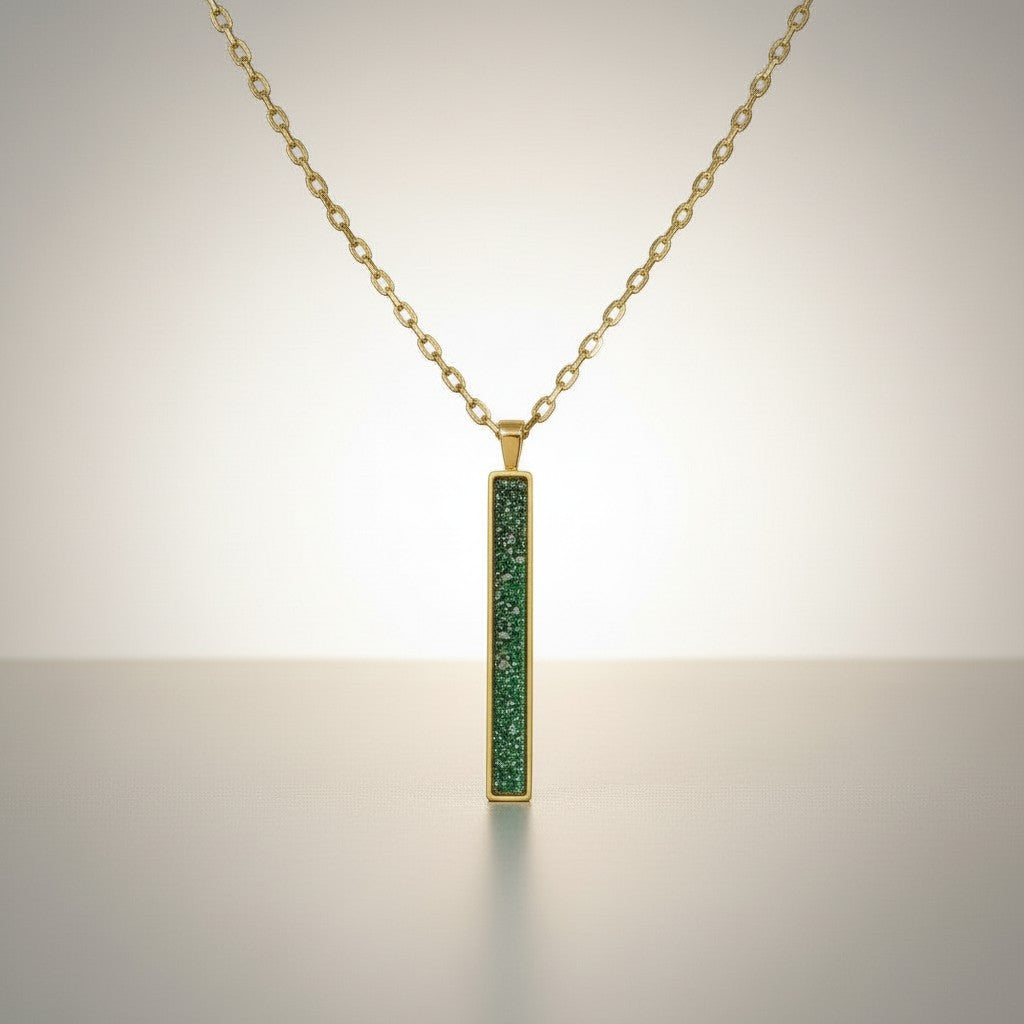 Ashes In Jewellery gold bar pendant with green memorial ashes inlay. Handmade keepsake necklace.