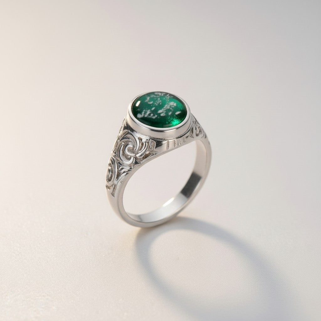Ashes In Jewellery handcrafted silver gents signet ring with black and white ashes encapsulated in glass.