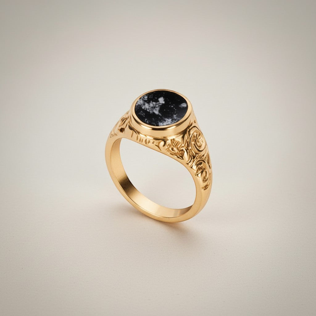 Ashes In Jewellery handcrafted silver gents ring with black encapsulated ashes and ornate detailing. Memorial jewellery.