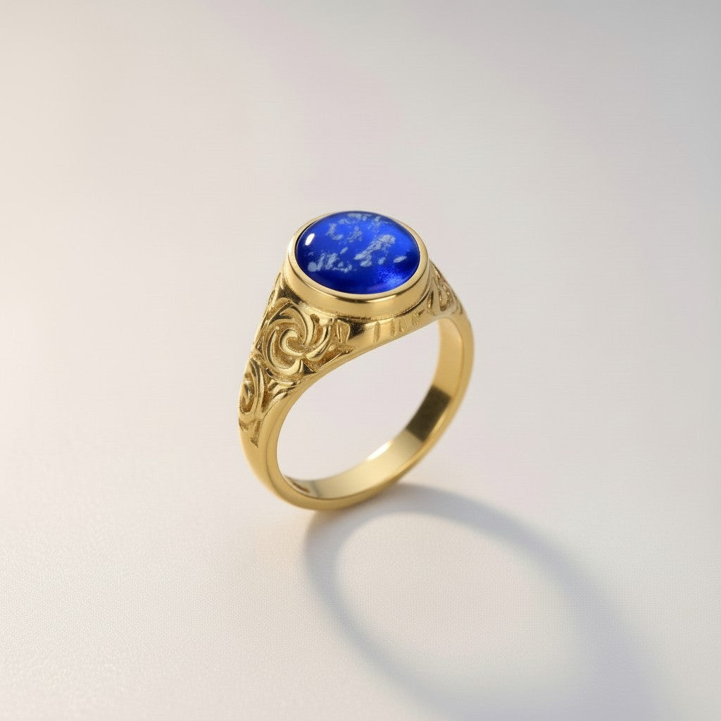 Ashes In Jewellery silver gents ring with blue glass encapsulating ashes and ornate scrollwork.