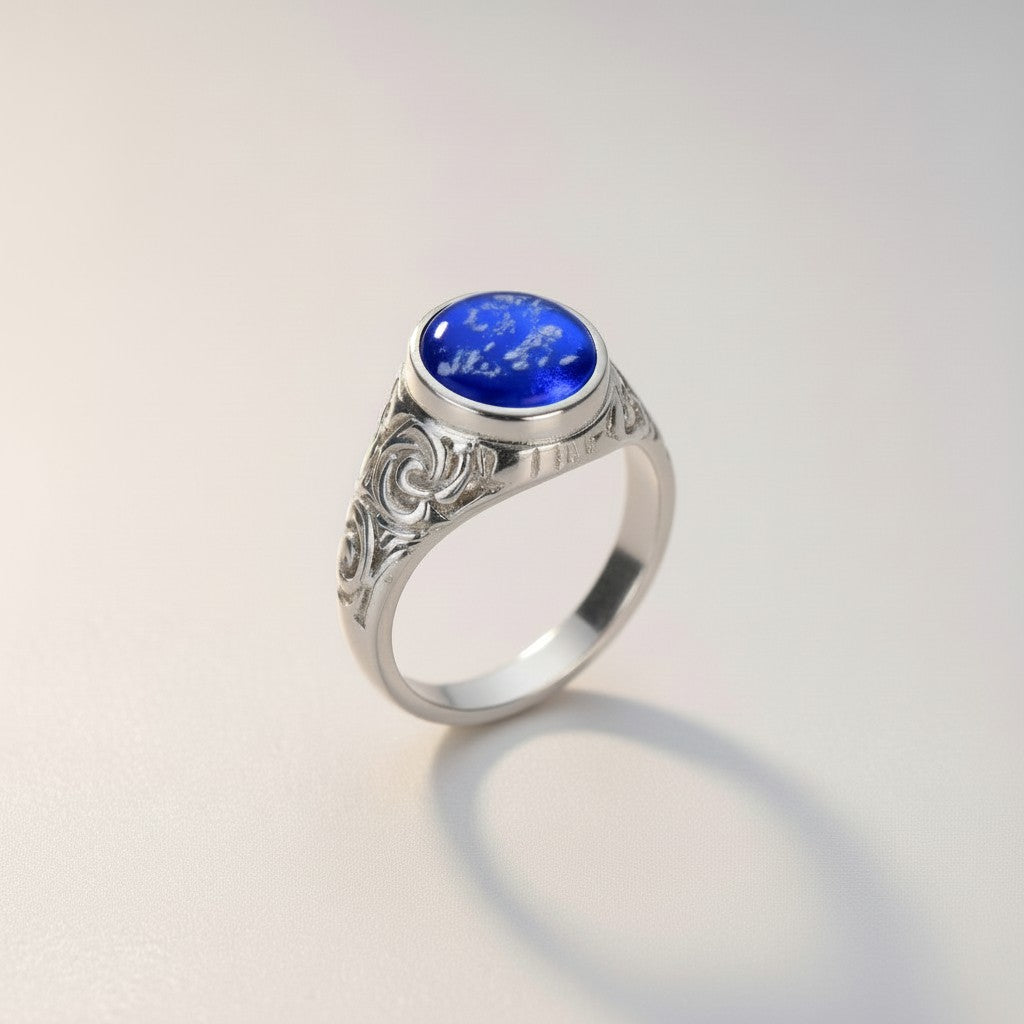 Ashes In Jewellery silver gents ring with green encapsulated ashes in glass oval stone and ornate detailing.