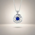 Ashes In Jewellery silver rose memorial pendant with blue lapis lazuli centre, designed to hold ashes.